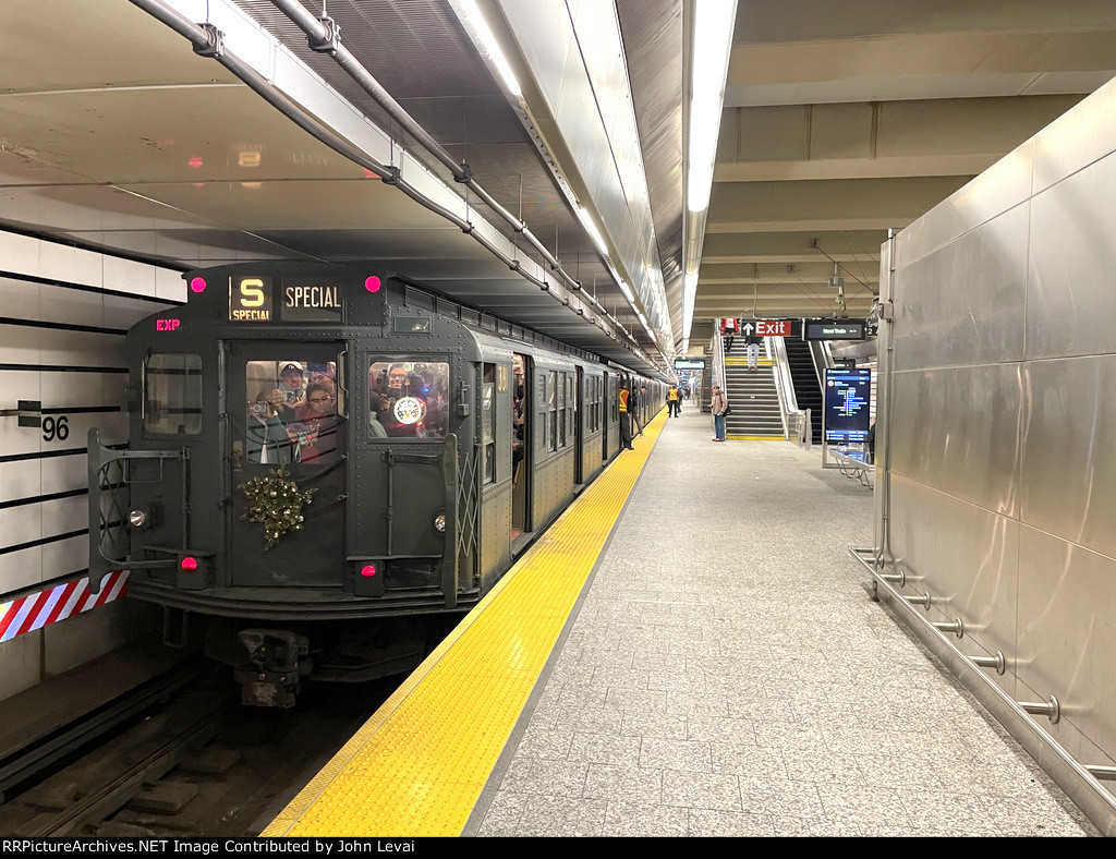 The first NYCTA Holiday Train trip of the day and season is about to end its run at 96th St Station.